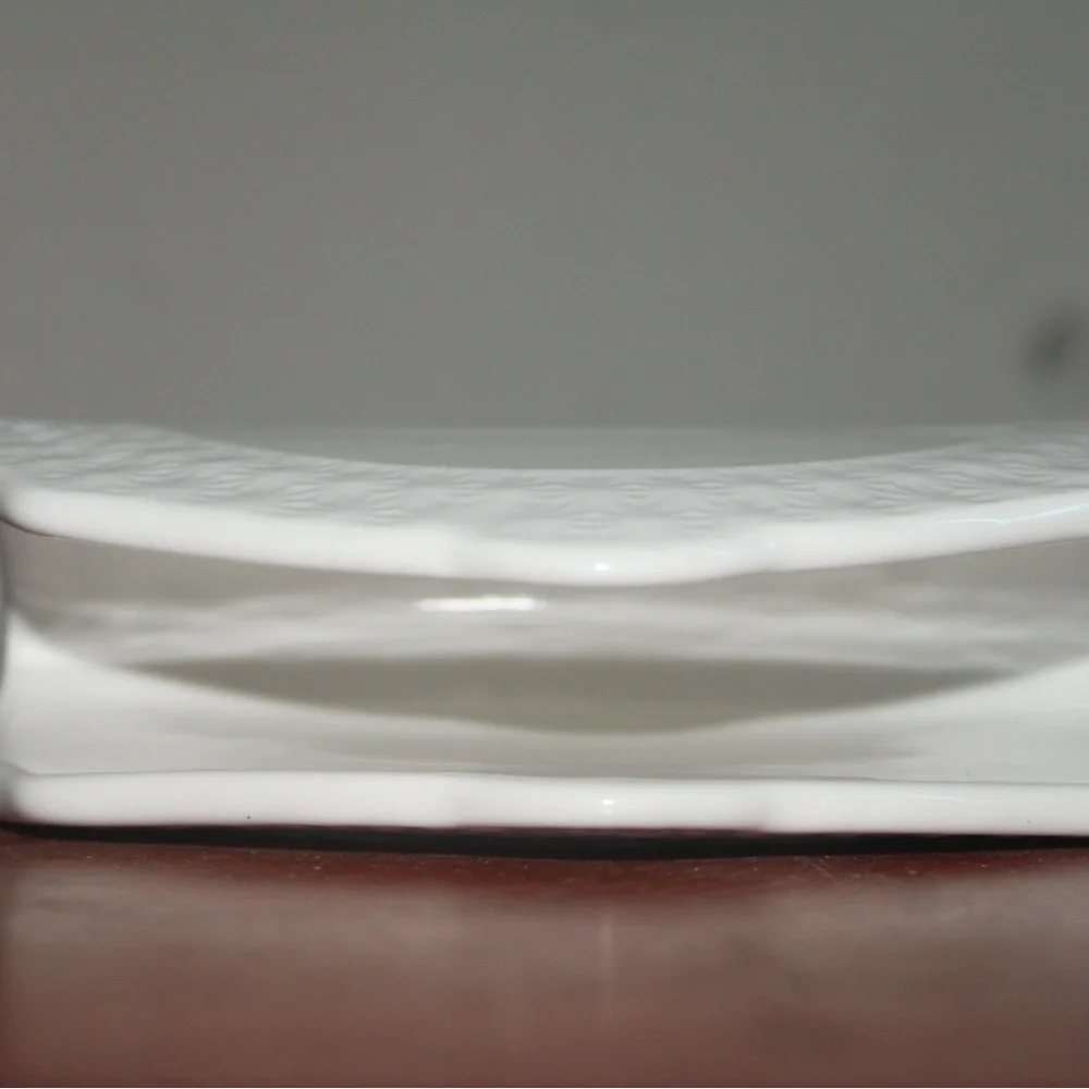 Elegant White Ceramic Embossed Napkin Holder